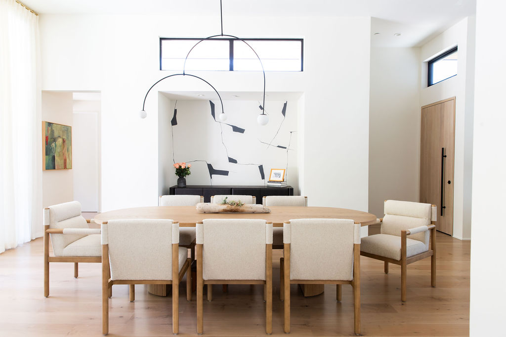 Dining Room in Marin County, California. Modern coastal dining room. Neutral dining room with modern light fixture. Luxury Residential Interior Designer in Northern California’s Wine Country, serving Healdsburg, Sonoma, Napa, and Marin.